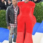 Helen Lasichanh, with Pharell Williams, in Commes des Garcons<br>